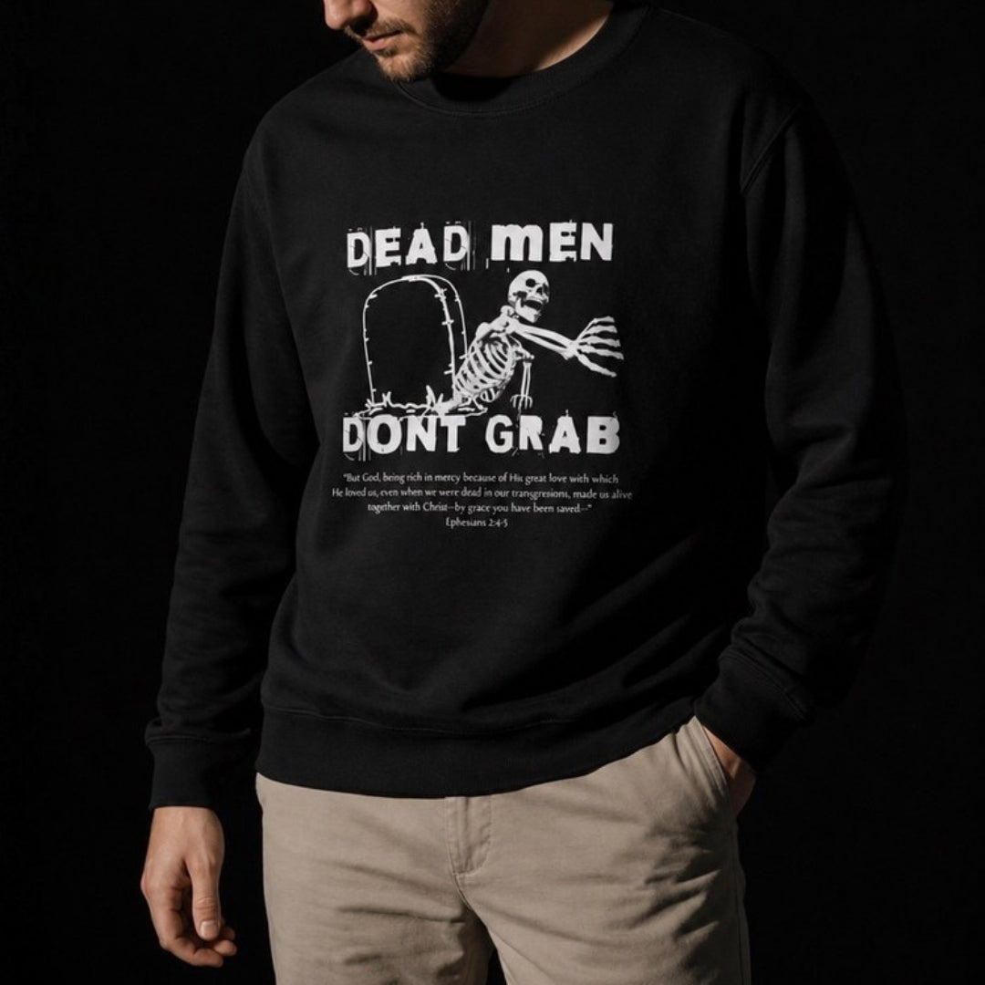 Dead Men Don't Grab crewneck sweatshirt – men's close-up lifestyle view showing chest print – Calvinist Apparel