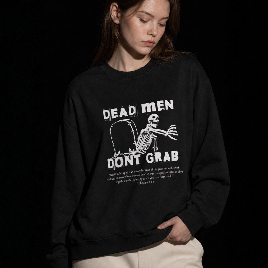 Dead Men Don't Grab crewneck sweatshirt – women's close-up lifestyle view of print – Calvinist Apparel