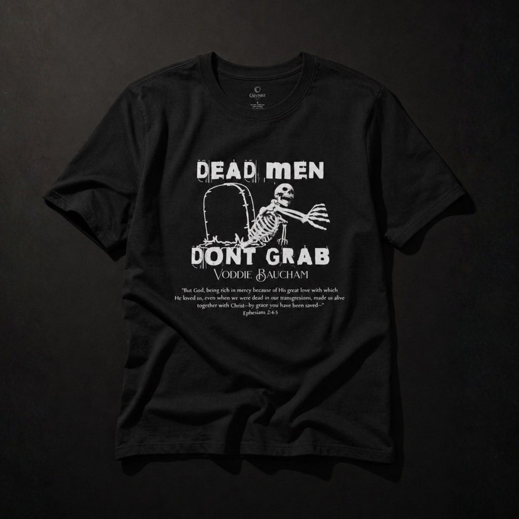 Dead Men Don't Grab black unisex tee front flat lay with white skeleton graphic and Ephesians 2:4–5