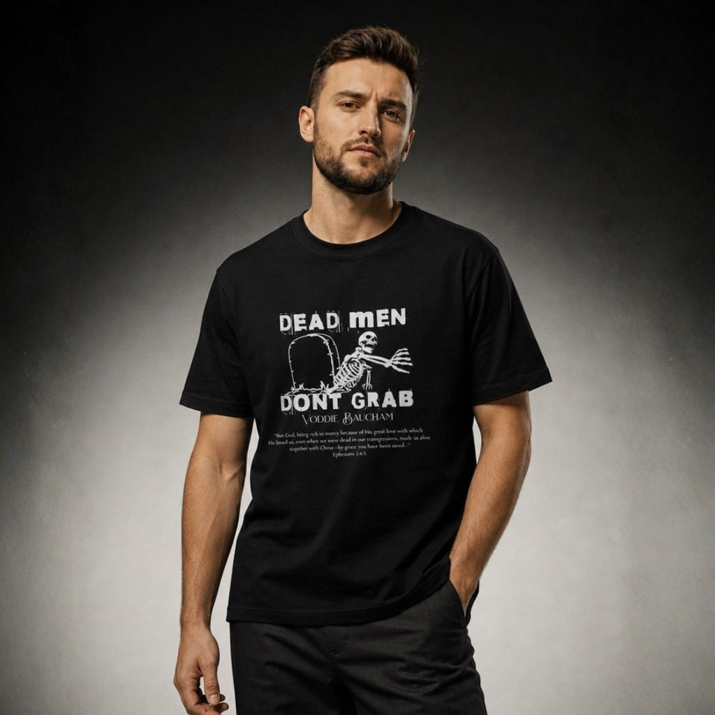 Dead Men Don't Grab unisex tee worn by male model in gray studio