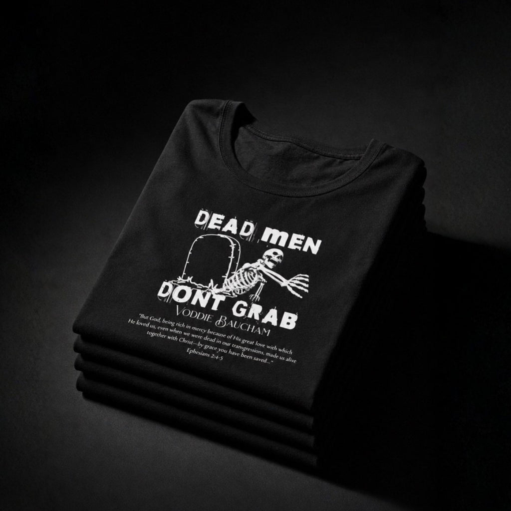 Folded black Dead Men Don't Grab unisex tees with white graphic