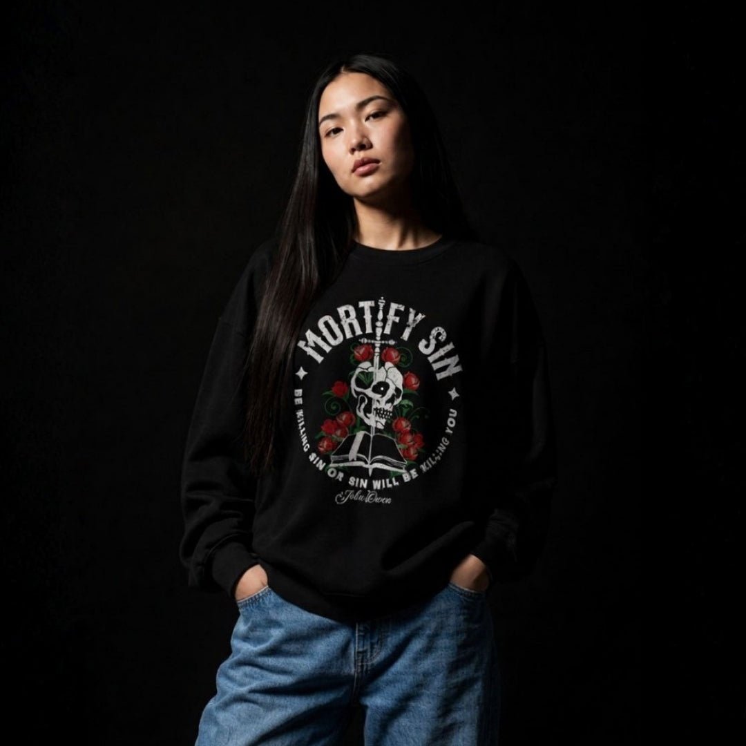 Mortify Sin crewneck sweatshirt – Women's black studio lifestyle full view – Calvinist Apparel