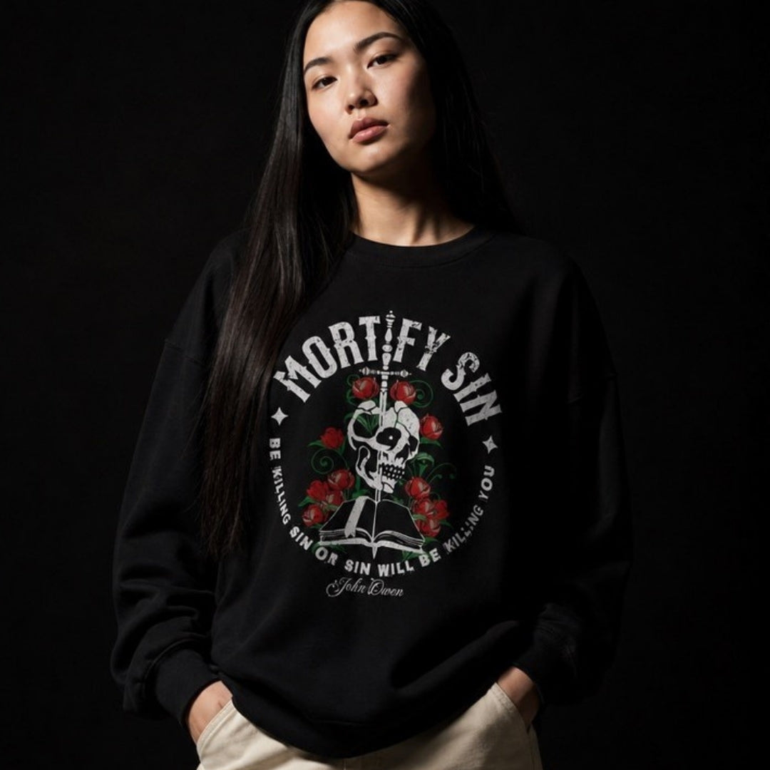 Mortify Sin crewneck sweatshirt – Women's close-up black studio view – Calvinist Apparel