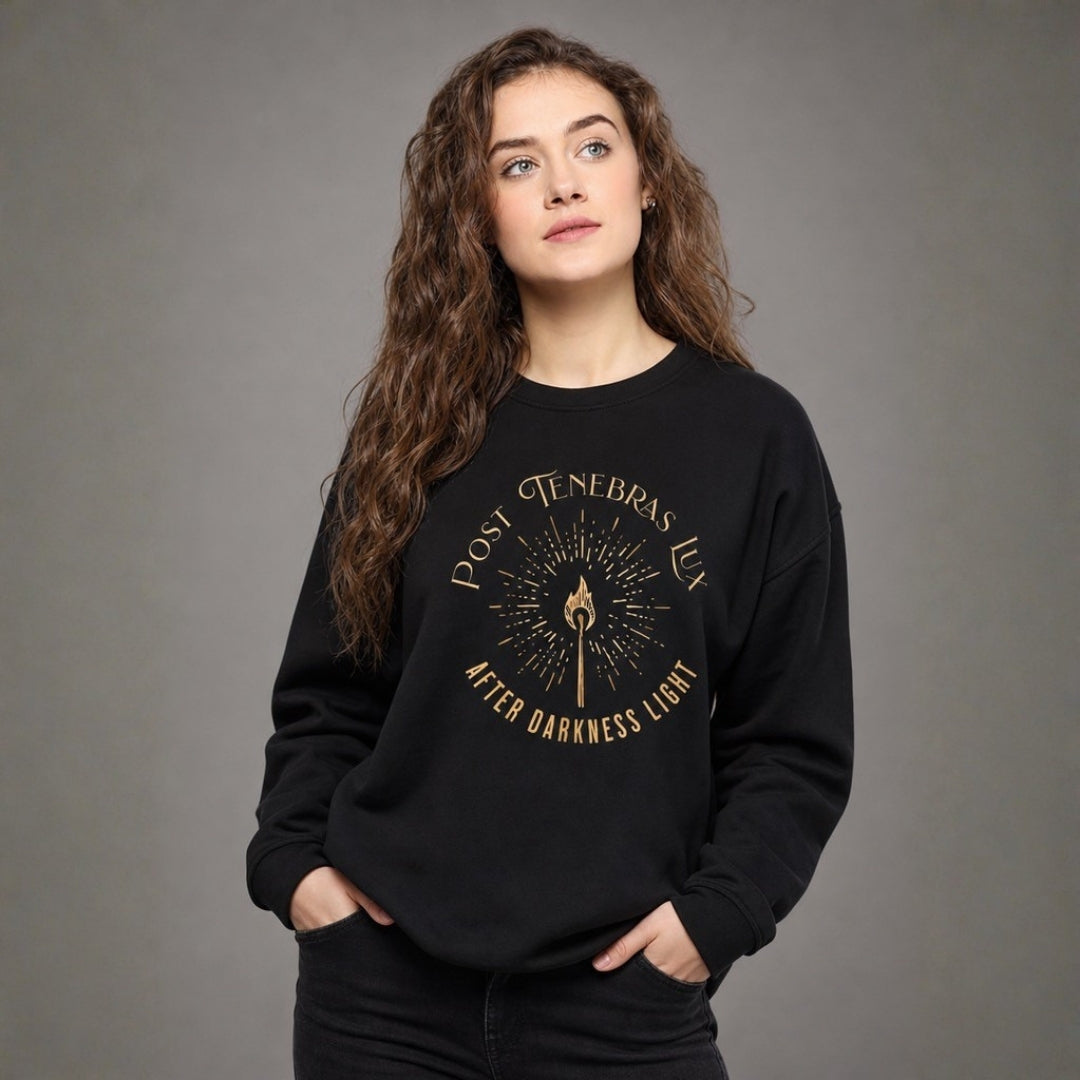 Female model wearing black Post Tenebras Lux sweatshirt with jeans